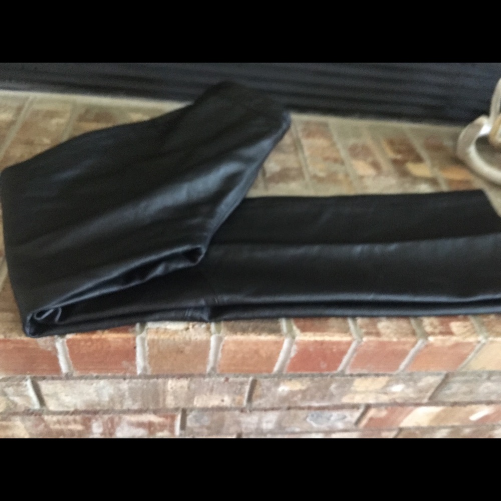 Copper key black leather pants